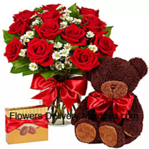 11 Red Roses With Some Ferns In A Glass Vase, A Cute 14 Inches Tall Teddy Bear And An Imported Box Of Chocolates