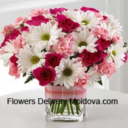 11 Red Roses, 11 White Daisies And 11 Pink Colored Carnations In A Glass Vase